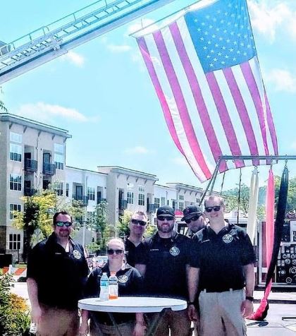 News Firefighters smiling for photo